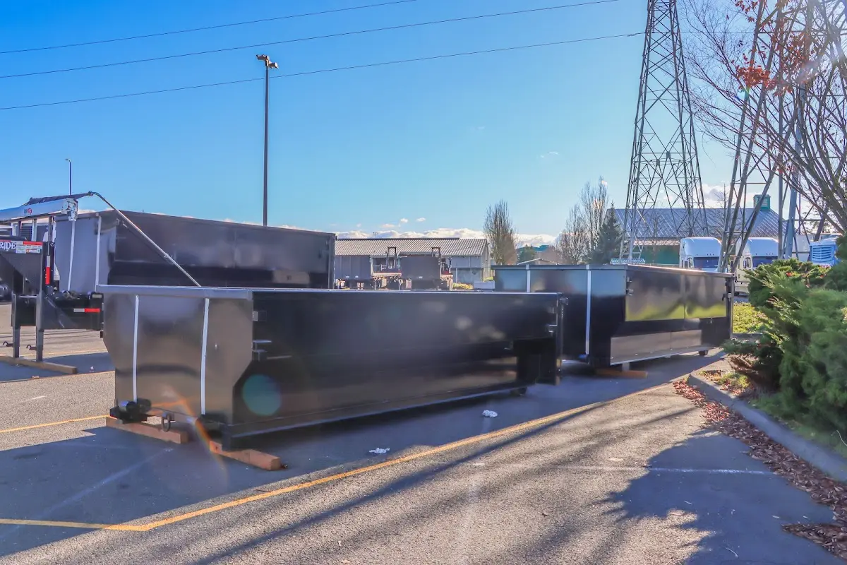 Roll-off dumpster ready for waste disposal at job site for 2 Yard Dumpster Rental in Pleasant Valley
